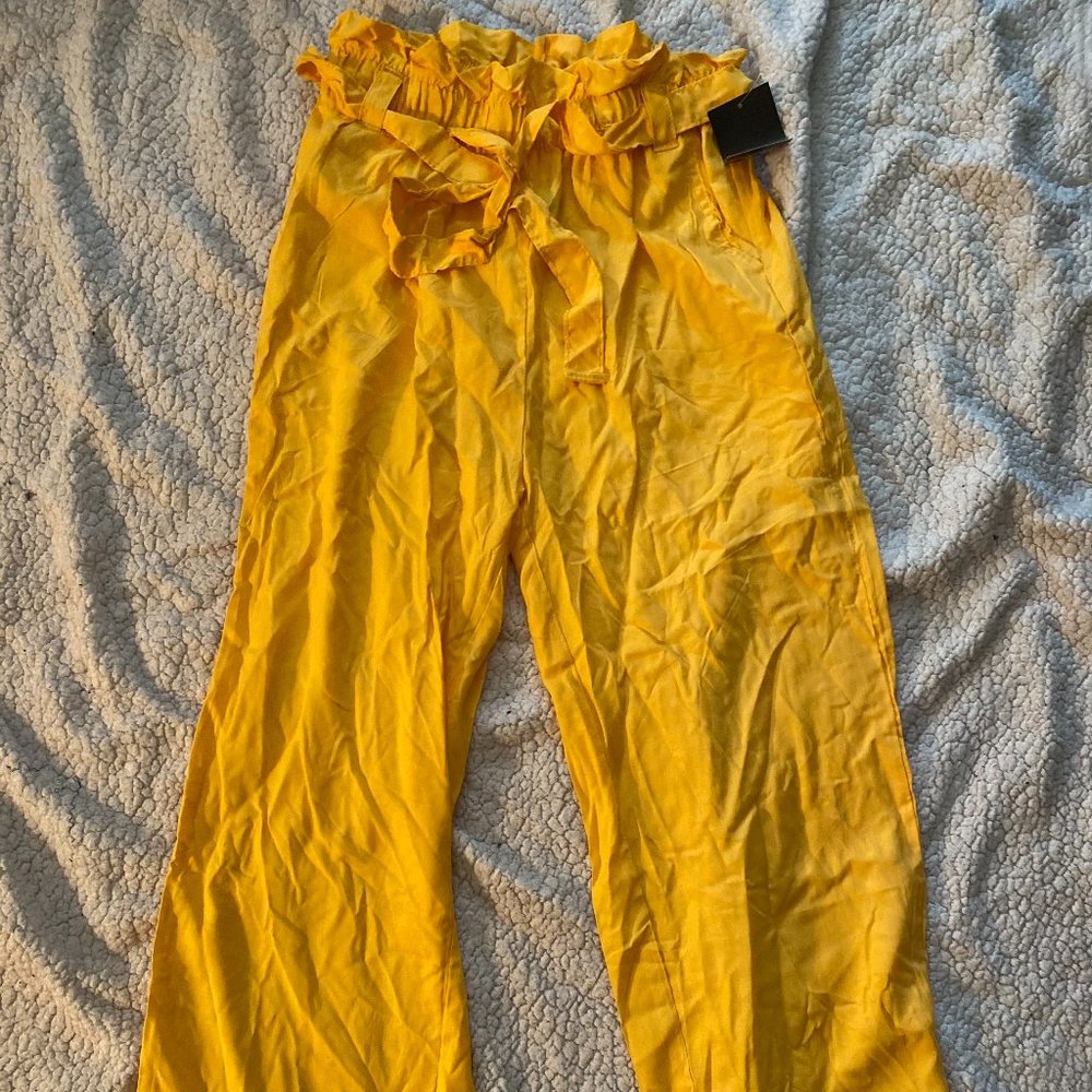 yellow flare pants with belt and pockets